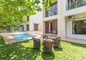 StayVista's Greenwoods Villa 8 - City-Center Villa with Private Pool, Terrace, Lift & Ping-Pong Table